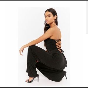 Black lace-up strapless jumpsuit